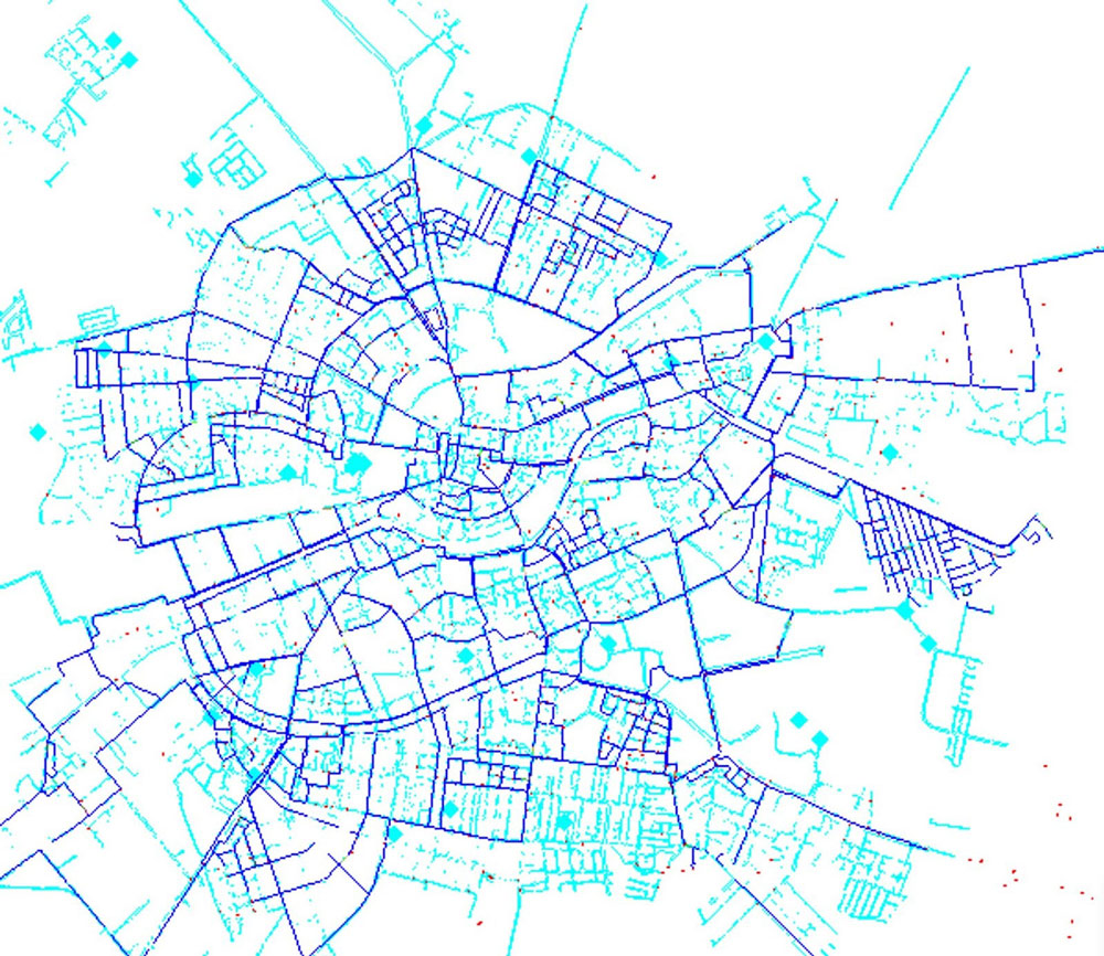 A complex map layout with intersecting blue lines, reminiscent of a masterful award winner's design, represents roads and streets. It forms a circular pattern with various geometric shapes and sections.