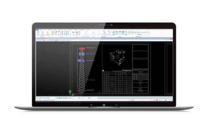 Laptop displaying engineering software with technical drawings, including a structure and tables, on-screen.