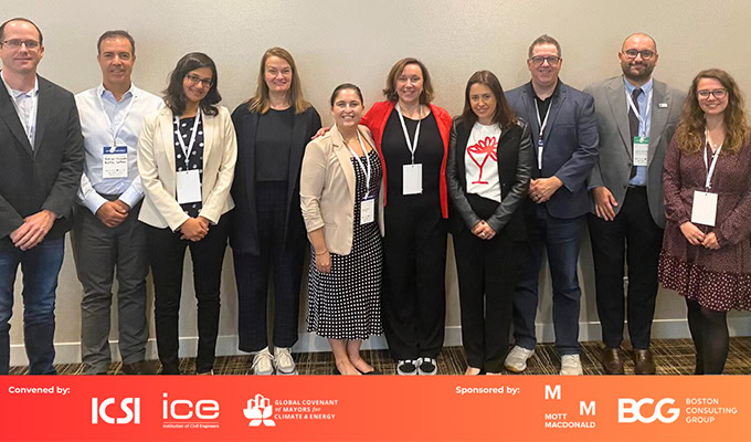 A group of ten people standing in front of a wall, some smiling. They are part of an event sponsored by ICSI, ICE, Mott MacDonald, BCG, and Global Covenant of Mayors for Climate & Energy.