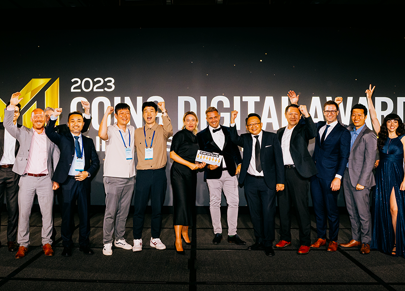 A group of people posing for a photo at the 2023 Going Digital Awards event.