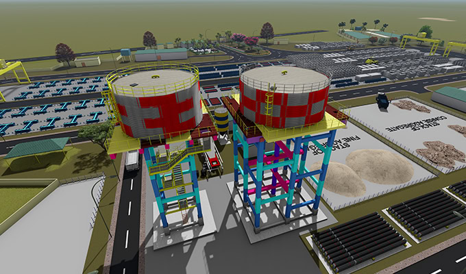 Representación digital de una instalación industrial con dos grandes núcleos sobre plataformas elevadas, maquinaria diversa y áreas de almacenamiento de materiales. El paisaje incluye carreteras e infraestructura.